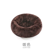Warm cat bed with donut shape and soft faux fur cover