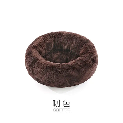Warm cat bed with donut shape and soft faux fur cover