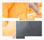 Soft cuddler pet bed with raised edges for comfort