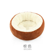Warm cat bed with donut shape and soft faux fur cover