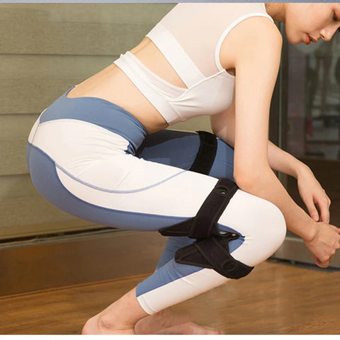 Knee stabilizer pad with spring support