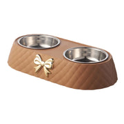 Bow-tie shaped pet feeder for cats and dogs