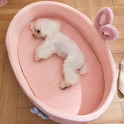 Warm and cozy pet bed with detachable padding