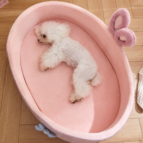 Warm and cozy pet bed with detachable padding