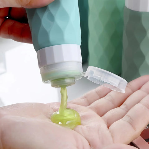 Portable refillable travel containers for liquids
