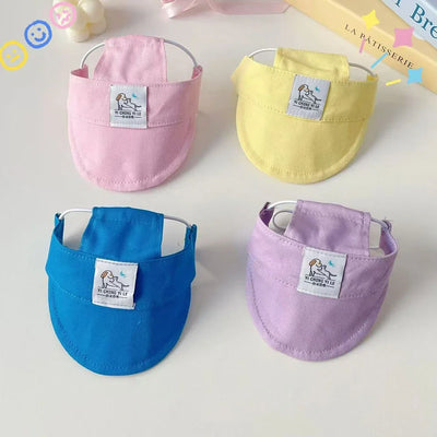 Adjustable dog sun hat with ear holes