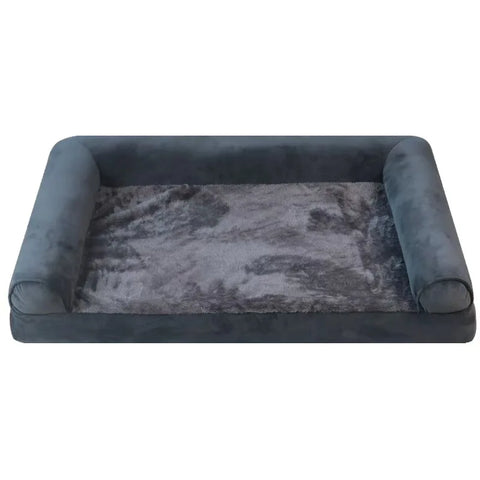 Supportive pet bed with plush surface and raised sides